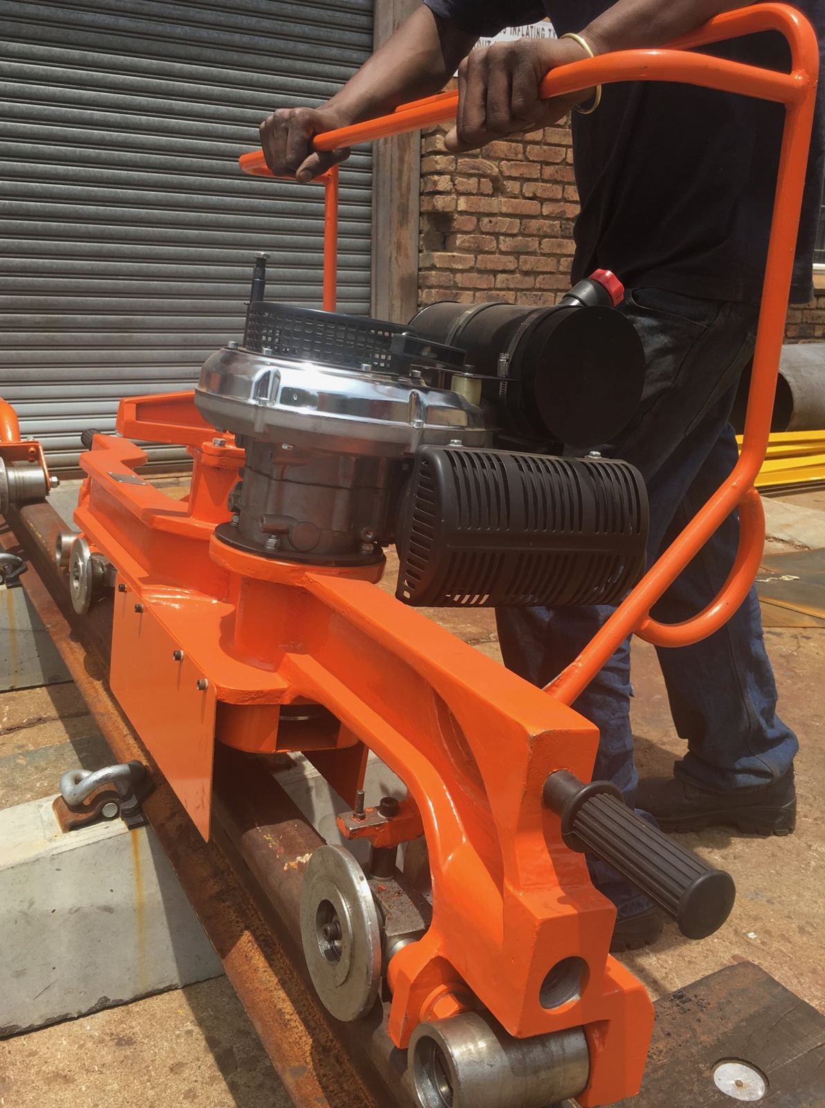 Finishing rail grinder in use on the track